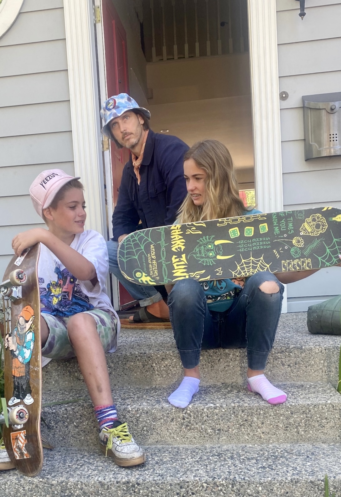 Daniel with kids and skateboards